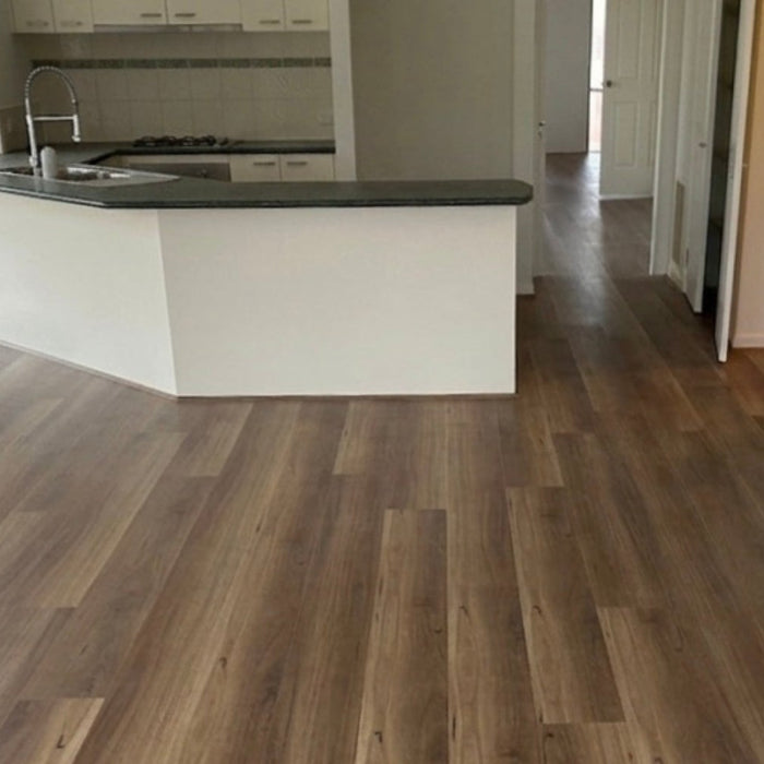 Spotted gum hybrid flooring installed in an open-plan Melbourne home