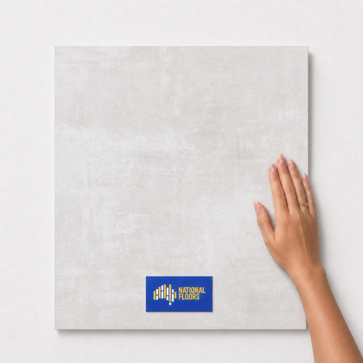 Oslo Ivory Matte TK28 600x600 tile with hand scale and National Floors card