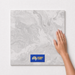 Nebula Matte TK35 600x600 tile with hand scale and National Floors card