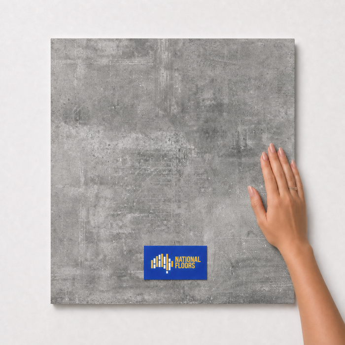 Oslo Slate Matte TK29 600x600 tile with hand scale and National Floors card