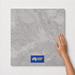 Nebula Slate TK34 600x600 tile with hand scale and National Floors card
