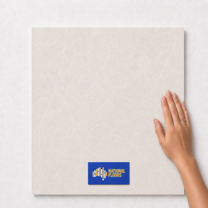 Light Taupe TM6 600x600 tile with hand scale and National Floors card