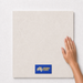 Light Taupe TM6 600x600 tile with hand scale and National Floors card