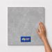 Silver Grey TM15 600x600 tile with hand scale and National Floors card