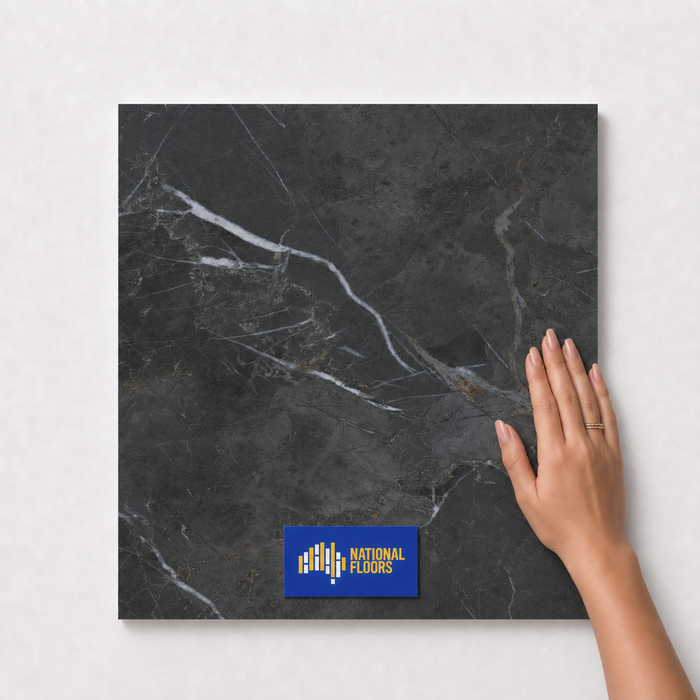 Smoky Black TM17 600x600 tile with hand scale and National Floors card