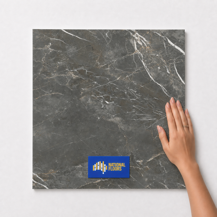 Shadow Grey TM19 600x600 tile with hand scale and National Floors card