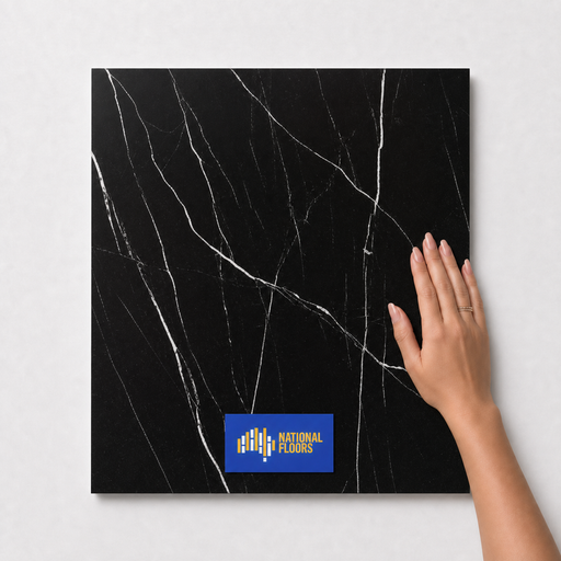 Jet Black TM28 600x600 tile with hand scale and National Floors card