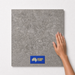Khaki TM60 600x600 tile with hand scale and National Floors card