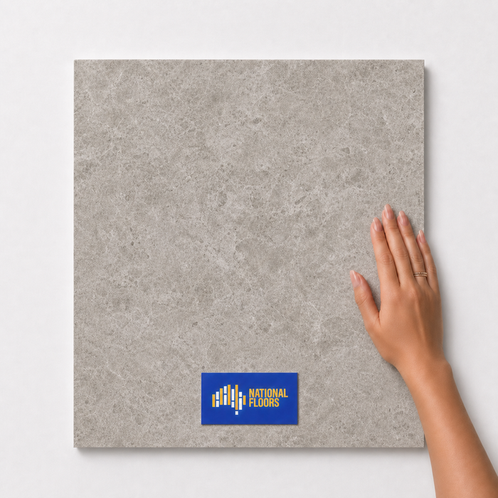 Pale Sand TM61 600x600 tile with hand scale and National Floors card