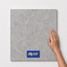 Iron Mist TM64 600x600 tile with hand scale and National Floors card