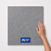 Heavy Grey TM74 600x600 tile with hand scale and National Floors card