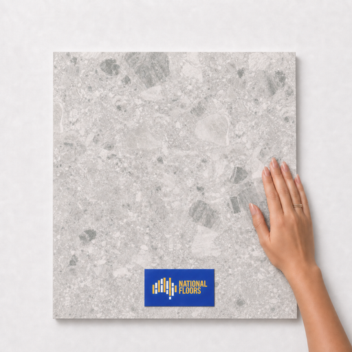 Light Ash TM77 600x600 tile with hand scale and National Floors card