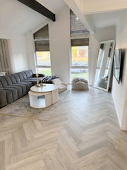 8mm hybrid herringbone installed by National Floors