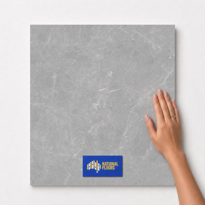 Stone TM14 600x600 tile with hand scale and National Floors card