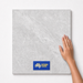 Urban Grey TM73 600x600 tile with hand scale and National Floors card
