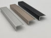 Black champagne and silver aluminium L Trims shown together
